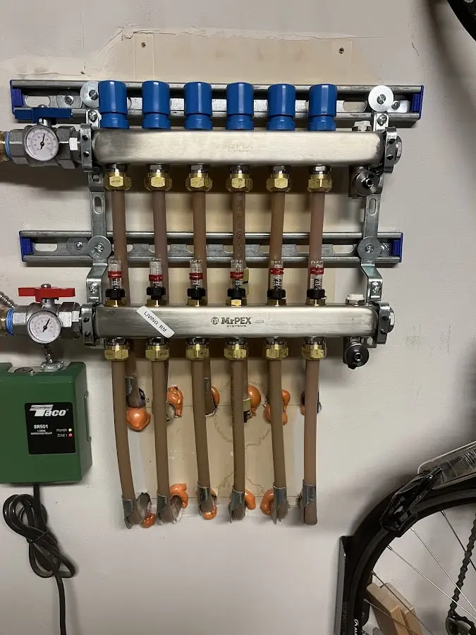 Plumber performing Water Heater Repair at a residential property in Silver Firs